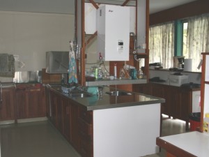Hot water urn and industrial dishwasher and sinks